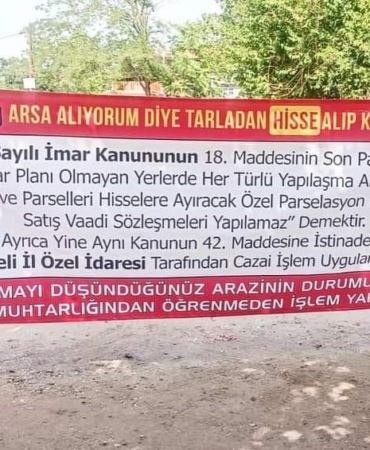 Köy muhtarından arsa alanlara pankartlı uyarı