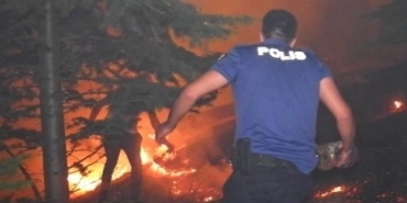 Ağaçlık alanda çıkan yangın evlere sıçramadan söndürüldü