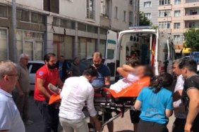 Cezaevi firarisi polisi görünce balkondan otomobilin tavanına atladı