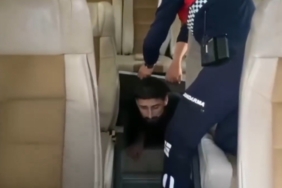 Minibüsün gizli bölmesinde 1 FETÖ üyesi ve 12 kaçak göçmen yakalandı