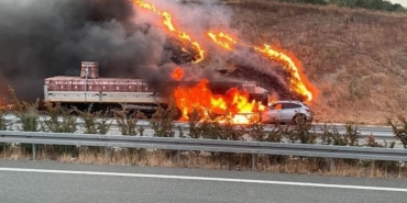 Alev topuna dönen araçtan yaralı kurtuldu