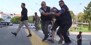 Karısını öldürüp kaçan Hasan Dim, geniş güvenlik önlemleriyle adliyeye sevk edildi