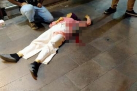 Tartıştığı eşini sokakta bıçakladı, linçten polis kurtardı