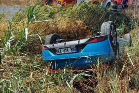 Takla atan otomobilden yaralı olarak kurtuldu