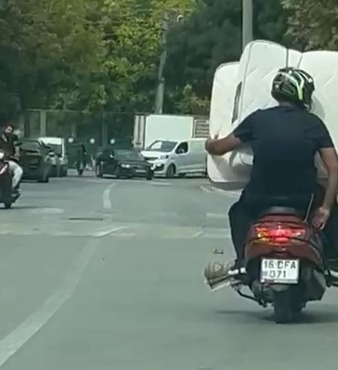 Yataklı motosiklet turu kamerada