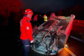 Takla atan araçtan yaralı kurtuldular