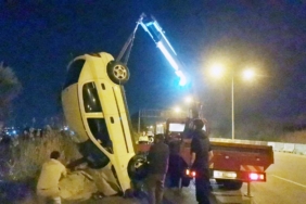 Takla atan otomobilden yaralı kurtuldu