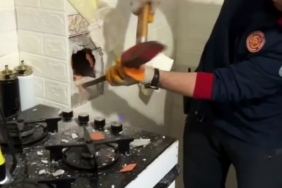 Soba bacasında sıkışan güvercinin yardımına itfaiye koştu