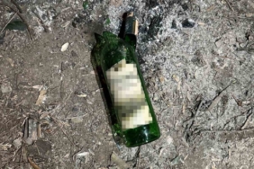 Katili içki şişesindeki parmak izi yakalattı