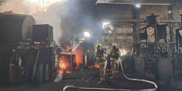 Balıkesir’de işyerinde çıkan yangını yakıt depolarına sıçramadan önlendi