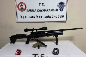 Üzerinden tüfek ve tabanca çıktı