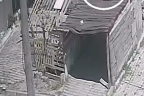 Deprem esnasında evinden garajın üzerine atladı