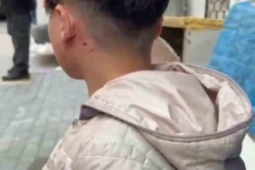 Camı tıklattığı için çocuğu darp etti