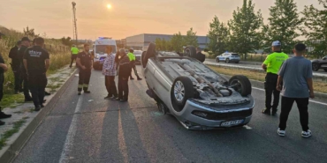 Ters dönen otomobilden yara almadan kurtuldu