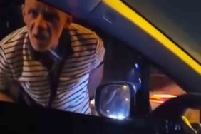 Sinyal vermeyen sürücünün önünü kesip camı yumrukladı