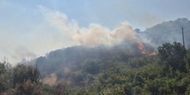 Balıkesir’de otluk ve makilik alanda çıkan yangın kontrol altına alındı