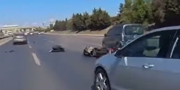 Arnavutköy’de motosikletli, araç altında kalmaktan son anda kurtuldu