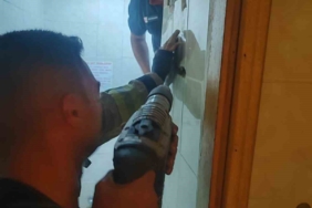 Telefonunu almak isterken metrelerce yükseklikten düşerek havalandırma boşluğunda mahsur kaldı