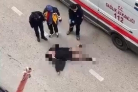 Yolun ortasında yatan kadın, sinir krizi geçirdi