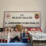 Jandarmanın baskın yaptığı evde kaçak tütün ve ruhsatsız silah ele geçirildi