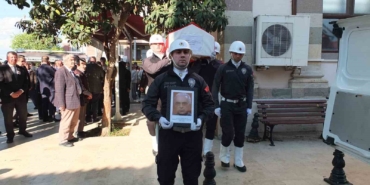 Burhaniye’de emekli müdür törenle toprağa verildi