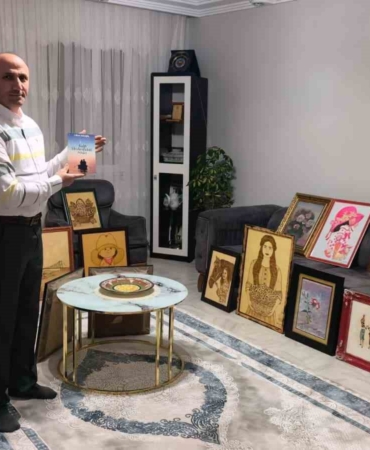Güvenlik görevlisi çatı katını sanat atölyesine çevirdi